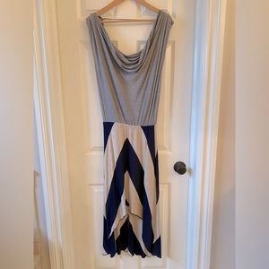 Designer jersey dress with deep v-neck back.